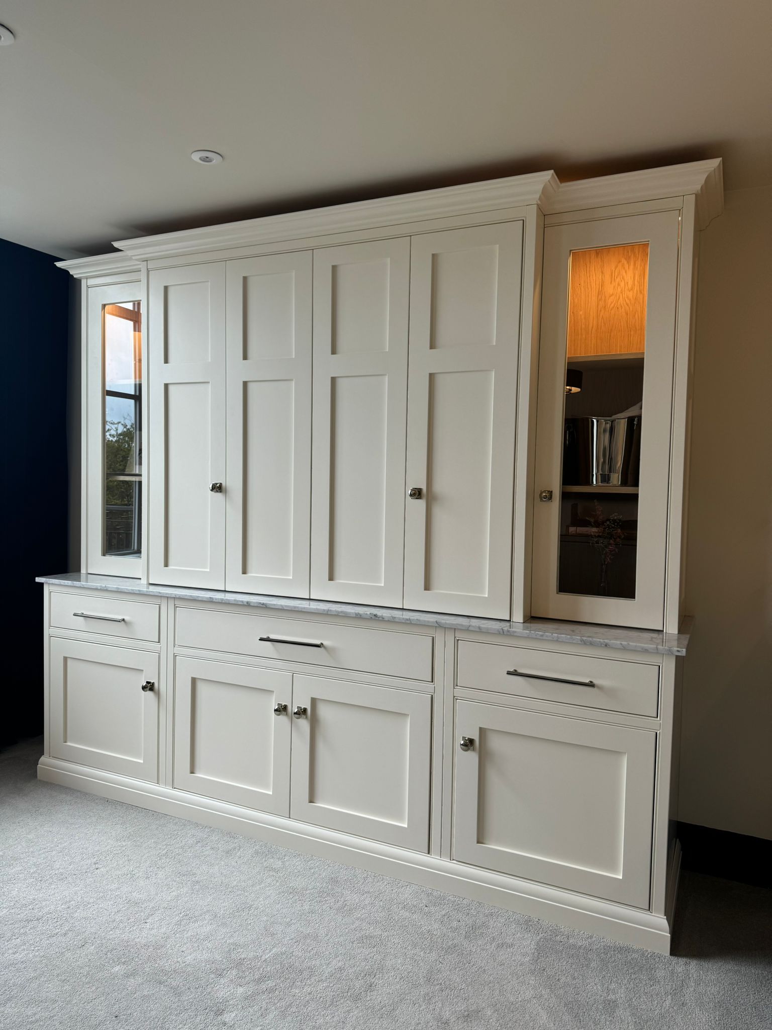 Media Wall with Hidden TV and glass cabinets